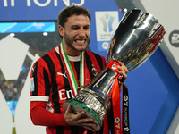 Davide Calabria right-back of AC Milan and Italy celebrates with the trophy after winning the EA SPORTS FC SUPERCUP 24/25 final match betwee...