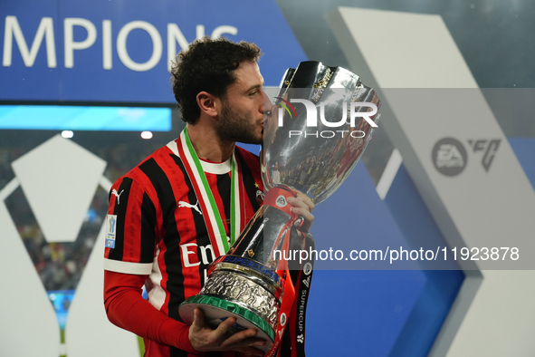 Davide Calabria right-back of AC Milan and Italy celebrates with the trophy after winning the EA SPORTS FC SUPERCUP 24/25 final match betwee...