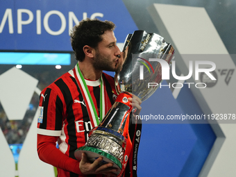 Davide Calabria right-back of AC Milan and Italy celebrates with the trophy after winning the EA SPORTS FC SUPERCUP 24/25 final match betwee...