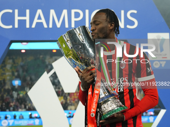 Tammy Abraham centre-forward of AC Milan and England celebrates with the trophy after winning the EA SPORTS FC SUPERCUP 24/25 final match be...