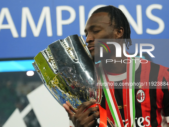 Tammy Abraham centre-forward of AC Milan and England celebrates with the trophy after winning the EA SPORTS FC SUPERCUP 24/25 final match be...