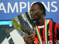 Tammy Abraham centre-forward of AC Milan and England celebrates with the trophy after winning the EA SPORTS FC SUPERCUP 24/25 final match be...