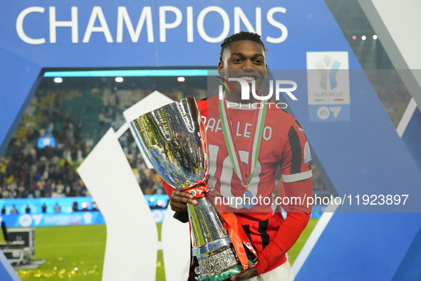 Rafael Leao left winger of AC Milan and Portugal celebrates with the trophy after winning the EA SPORTS FC SUPERCUP 24/25 final match betwee...