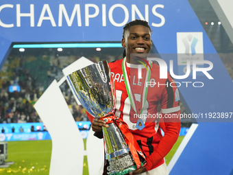 Rafael Leao left winger of AC Milan and Portugal celebrates with the trophy after winning the EA SPORTS FC SUPERCUP 24/25 final match betwee...