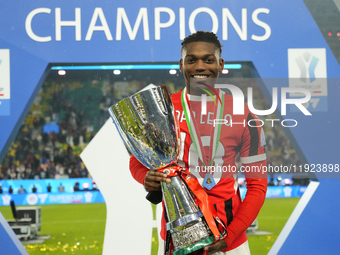 Rafael Leao left winger of AC Milan and Portugal celebrates with the trophy after winning the EA SPORTS FC SUPERCUP 24/25 final match betwee...