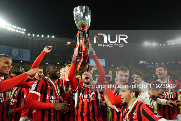 Davide Calabria right-back of AC Milan and Italy lifts the trophy after winning with his team during the EA SPORTS FC SUPERCUP 24/25 final m...