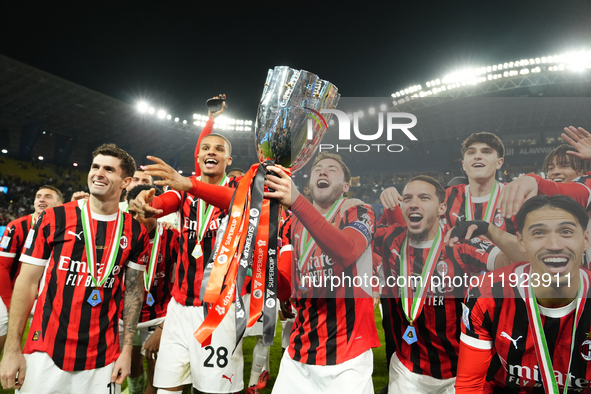 Davide Calabria right-back of AC Milan and Italy lifts the trophy after winning with his team during the EA SPORTS FC SUPERCUP 24/25 final m...