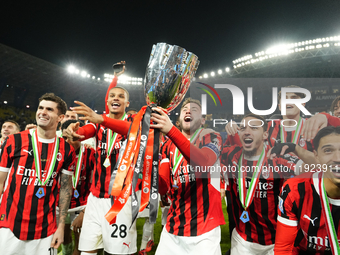 Davide Calabria right-back of AC Milan and Italy lifts the trophy after winning with his team during the EA SPORTS FC SUPERCUP 24/25 final m...