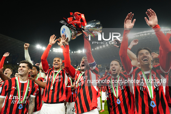 Davide Calabria right-back of AC Milan and Italy lifts the trophy after winning with his team during the EA SPORTS FC SUPERCUP 24/25 final m...