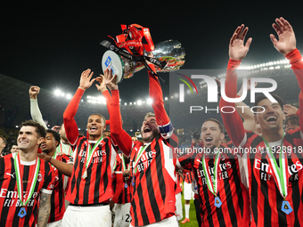 Davide Calabria right-back of AC Milan and Italy lifts the trophy after winning with his team during the EA SPORTS FC SUPERCUP 24/25 final m...