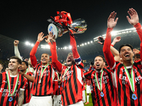 Davide Calabria right-back of AC Milan and Italy lifts the trophy after winning with his team during the EA SPORTS FC SUPERCUP 24/25 final m...