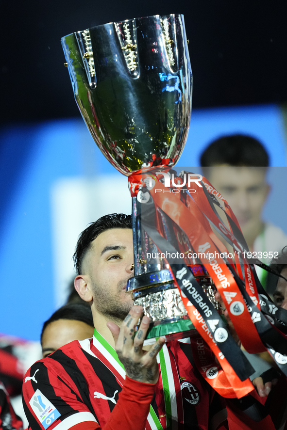 Theo Hernandez left-back of AC Milan and France lifts the trophy after winning with his team the EA SPORTS FC SUPERCUP 24/25 final match bet...