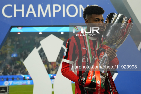 Emerson Royal right-back of AC Milan and Brazil celebrates with the trophy after winning the EA SPORTS FC SUPERCUP 24/25 final match between...