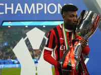 Emerson Royal right-back of AC Milan and Brazil celebrates with the trophy after winning the EA SPORTS FC SUPERCUP 24/25 final match between...