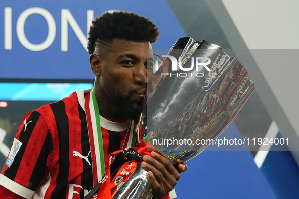 Emerson Royal right-back of AC Milan and Brazil celebrates with the trophy after winning the EA SPORTS FC SUPERCUP 24/25 final match between...