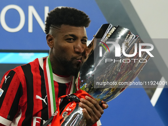 Emerson Royal right-back of AC Milan and Brazil celebrates with the trophy after winning the EA SPORTS FC SUPERCUP 24/25 final match between...