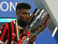 Emerson Royal right-back of AC Milan and Brazil celebrates with the trophy after winning the EA SPORTS FC SUPERCUP 24/25 final match between...