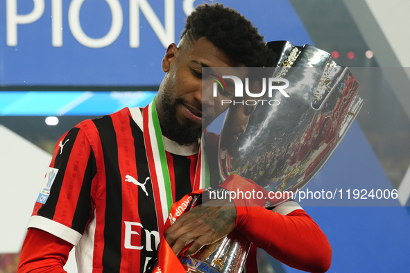 Emerson Royal right-back of AC Milan and Brazil celebrates with the trophy after winning the EA SPORTS FC SUPERCUP 24/25 final match between...