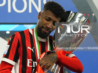 Emerson Royal right-back of AC Milan and Brazil celebrates with the trophy after winning the EA SPORTS FC SUPERCUP 24/25 final match between...