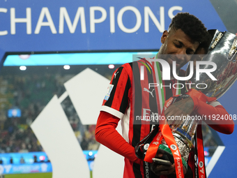 Emerson Royal right-back of AC Milan and Brazil celebrates with the trophy after winning the EA SPORTS FC SUPERCUP 24/25 final match between...