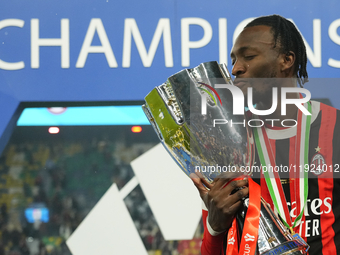 Tammy Abraham centre-forward of AC Milan and England celebrates with the trophy after winning the EA SPORTS FC SUPERCUP 24/25 final match be...