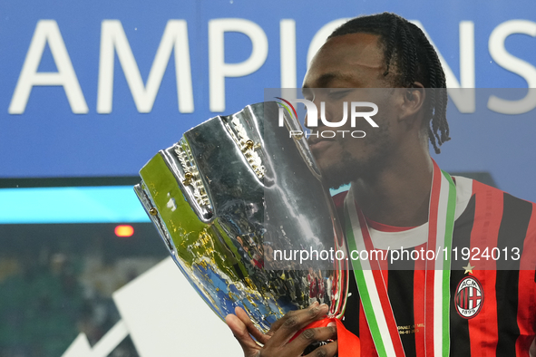 Tammy Abraham centre-forward of AC Milan and England celebrates with the trophy after winning the EA SPORTS FC SUPERCUP 24/25 final match be...