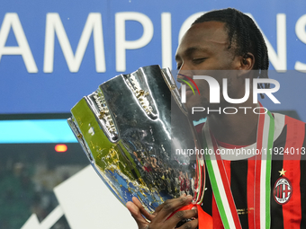 Tammy Abraham centre-forward of AC Milan and England celebrates with the trophy after winning the EA SPORTS FC SUPERCUP 24/25 final match be...