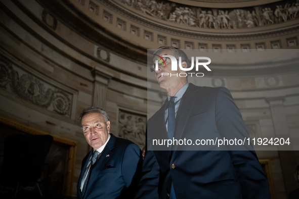 Senate Majority Leader John Thuns (R-SD) right and Minority Leader Chuck Schumer (D-NY) participate in a procession of Senators to the House...