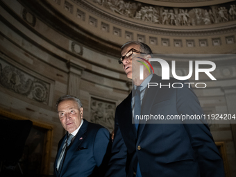 Senate Majority Leader John Thuns (R-SD) right and Minority Leader Chuck Schumer (D-NY) participate in a procession of Senators to the House...