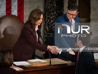 Vice President Kamala Harris shakes hands with Rep. Bryan Steil (R-WI) prior to certifying the 2024 presidential electoral vote in a joint s...