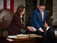 Vice President Kamala Harris shakes hands with Rep. Bryan Steil (R-WI) prior to certifying the 2024 presidential electoral vote in a joint s...