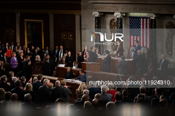 Senators and Representatives applaud Vice President Kamala Harris at the conclusion of a joint session certifying the results of the 2024 pr...