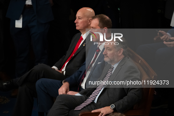 Senator Ted Cruz (R-TX) (right) sits in the front row during a joint session of Congress certifying the results of the 2024 presidential ele...