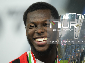 Yunus Musah central midfield of AC Milan and United States celebrates with the trophy after winning the EA SPORTS FC SUPERCUP 24/25 final ma...