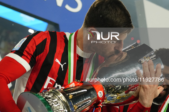 Matteo Gabbia centre-back of AC Milan and Italy celebrates with the trophy after winning the EA SPORTS FC SUPERCUP 24/25 final match between...