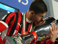 Matteo Gabbia centre-back of AC Milan and Italy celebrates with the trophy after winning the EA SPORTS FC SUPERCUP 24/25 final match between...