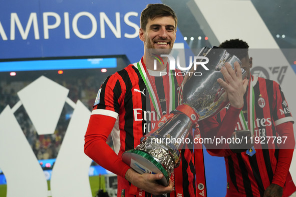 Matteo Gabbia centre-back of AC Milan and Italy celebrates with the trophy after winning the EA SPORTS FC SUPERCUP 24/25 final match between...