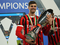 Matteo Gabbia centre-back of AC Milan and Italy celebrates with the trophy after winning the EA SPORTS FC SUPERCUP 24/25 final match between...