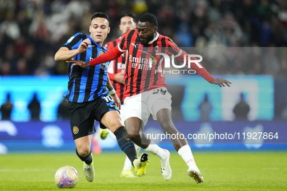 Lautaro Martinez centre-forward of Internazionale and Argentina and Youssouf Fofana defensive midfield of AC Milan and France compete for th...