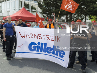 Gillette employees rally in support of the demands made by German union IG Metall in the ongoing collective wage negotiations, during a warn...