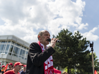 Union IG Metall Berlin leader, Klaus Abel, speaks to employees during a rally in support of the demands made by German union IG Metall in th...