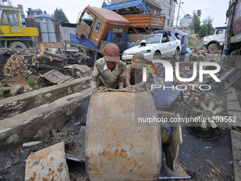 SUDHIR KUMAR PATEL, 28 yrs old, migrated from India along with his friend shifting heavy duty roller's to cut with Oxygen Acetylene Gas as S...