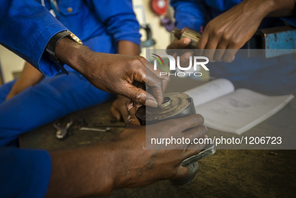 Students of the Automechanical course assemble starter motor during their practical lesson at workshop in the Windhoek Vocational Training C...