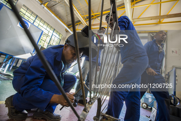 Working process in the workshop of Welding and Fabricating course of the Windhoek Vocational Training Centre, Namibia, on May 12, 2016. Stud...