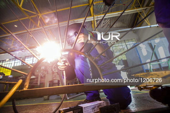 Working process in the workshop of Welding and Fabricating course of the Windhoek Vocational Training Centre, Namibia, on May 12, 2016. Stud...