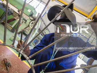 Working process in the workshop of Welding and Fabricating course of the Windhoek Vocational Training Centre, Namibia, on May 12, 2016. Stud...