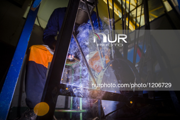 Working process in the workshop of Welding and Fabricating course of the Windhoek Vocational Training Centre, Namibia, on May 12, 2016. Stud...