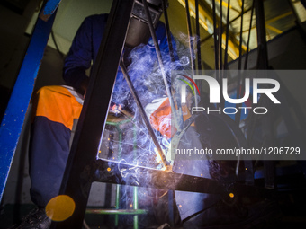 Working process in the workshop of Welding and Fabricating course of the Windhoek Vocational Training Centre, Namibia, on May 12, 2016. Stud...