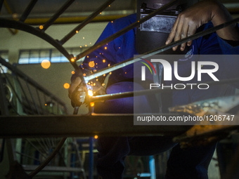 Working process in the workshop of Welding and Fabricating course of the Windhoek Vocational Training Centre, Namibia, on May 12, 2016. Stud...