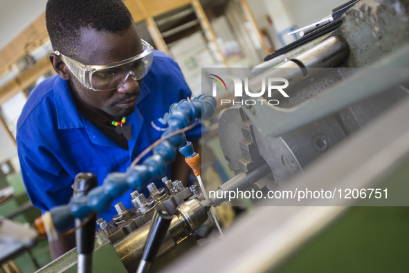 Fitting and Turning Trade of the Windhoek Vocational Training Centre, Namibia, on May 12, 2016. Students work with Lathe machine making a wo...